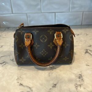 Louis Vuitton: Mini Speedy Nano LV Monogram Bag